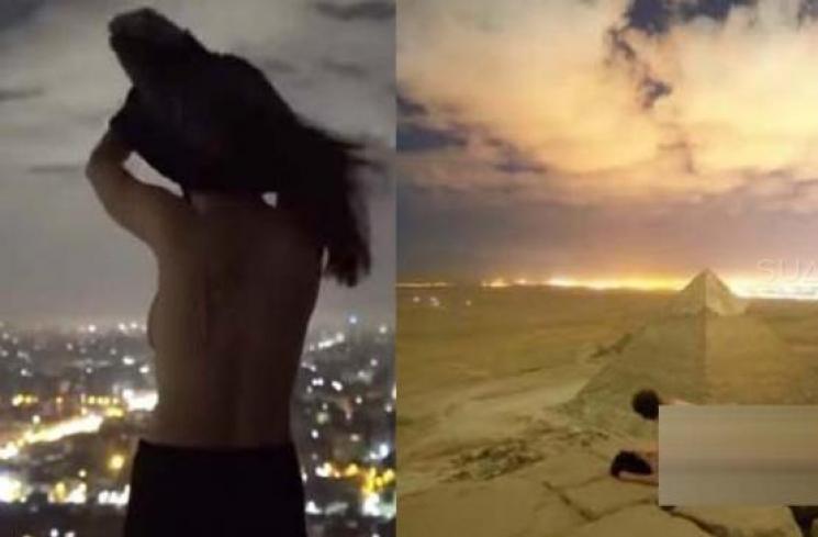 Seorang fotografer Denmark bernama Andreas Hvid memicu kemarahan publik Mesir, setelah mendaki puncak Piramida agung Giza dan berhubungan intim dengan perempuan di atasnya. [Youtube/Andreas Hvid]
